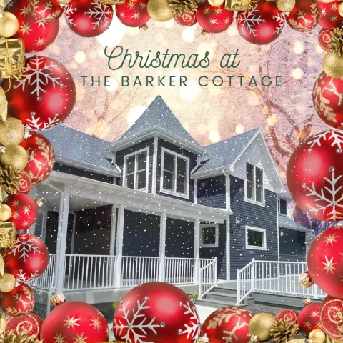 A dark blue cottage with white trim and railings is shown in winter, framed by red and gold Christmas ornaments. Text reads, "Christmas at The Barker Cottage." Snow is gently falling in the scene.