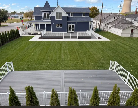 The green space at the Barker Cottage showcases two expansive decks.